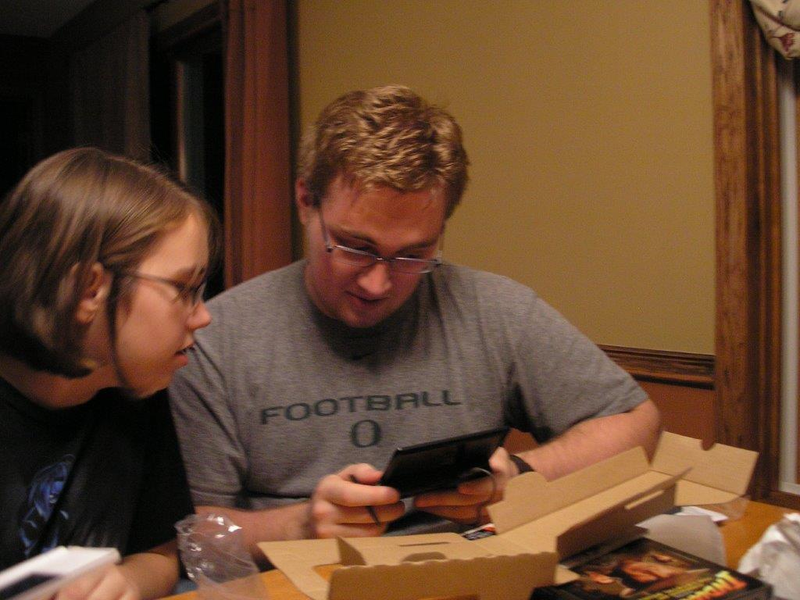 Mike received a Nintendo DS Lite for his 22nd birthday. I’m sitting next to him with my own DS.